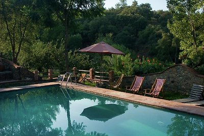 Casa in pietra sul fiume Zoya con vista sulla