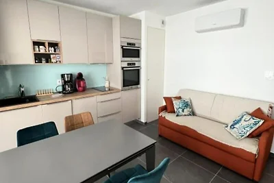 Wohnung in Grau du Roi am Strand