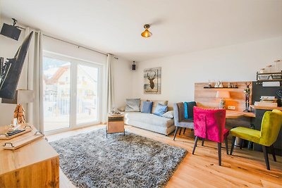 Appartement met skibus voor de deur