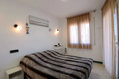 Appartement aan strand L'Estartit met zwembad