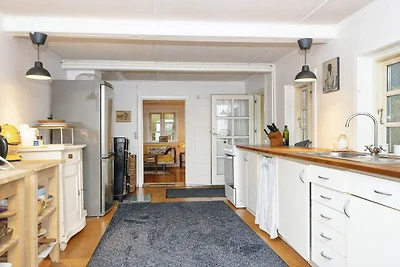 Casa vacanze sul lago con foresta