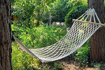 Chalet in una riserva naturale con giardino