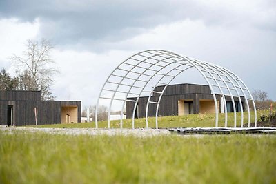 Wellness-Lodge mit Sauna in einem Ferienpark