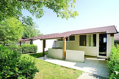 Bungalow in Caorle with garden furniture