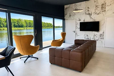 Gemütliches Haus am Wasser mit Whirlpool