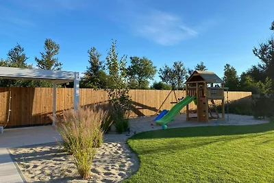 Chalet contemporaneo in un parco vacanze