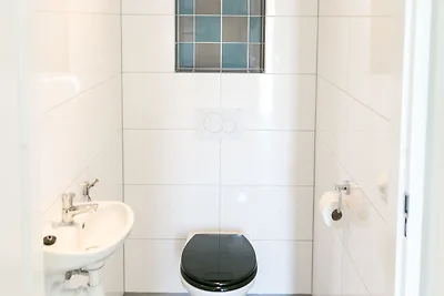 Moderna casa vacanze con giardino d'inverno