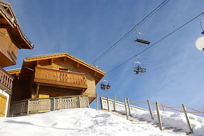 Nice chalet on a sunny mountain side on the s...