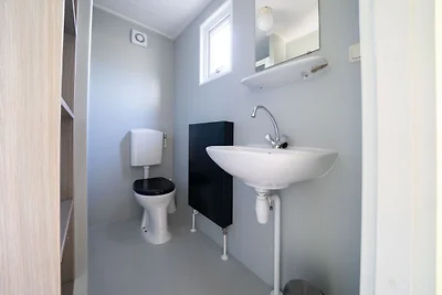 Knusse mobilhome bij Park De Veluwe