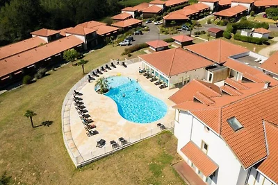 Appartement in Cassen met zwembad en spa