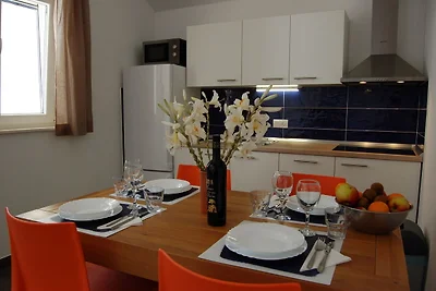 Apartment in Veli Rat mit Dachterrasse