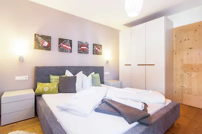 Ferienhaus mit verschneitem Blick