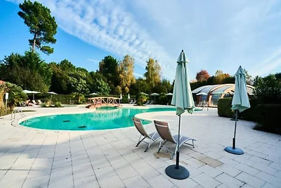 Ferienwohnung am See von Parentis mit Pool