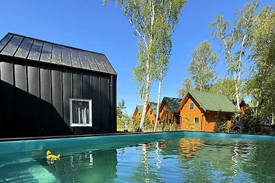Ferienhäuser mit Schwimmbad in Dziwnów.