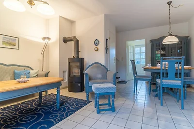 Apartment mit Kamin in einer reetgedeckten...