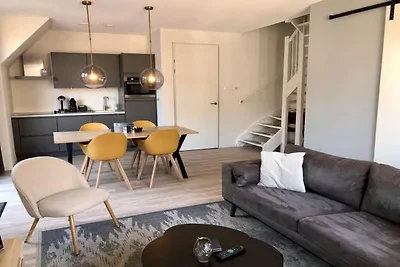 Lodge mit Blick auf die Kirche und die Dünen