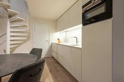Modern appartement vlakbij zee en strand