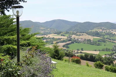 Appartamento con piscina e parcheggio