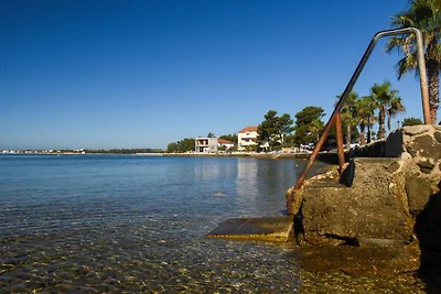 Apartment Kostanjevac with Terrace and Sea...