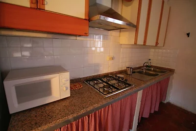 Cottage rustico a Magione con giardino