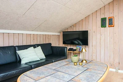 Familiehuisje met terras en gazon