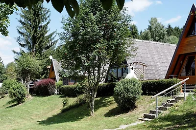 Chalet con terrazza vicino ad un lago...