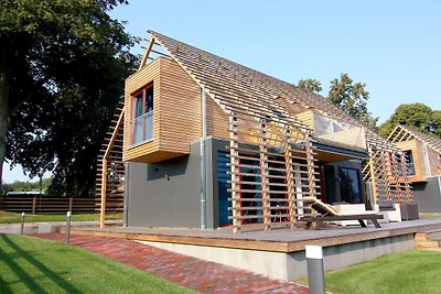 Chalet bij Schwerin met Golf en Paardrijden