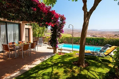Bungalow mit Gemeinschaftspool