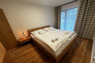 Appartement in Cerny Dul vlakbij skigebied