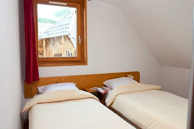 Wohnung in Les Sybellen mit Hängen