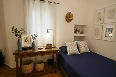 Haus in Lefkes mit Blick auf das Dorf