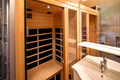 Chalet attraente con vasca idromassaggio