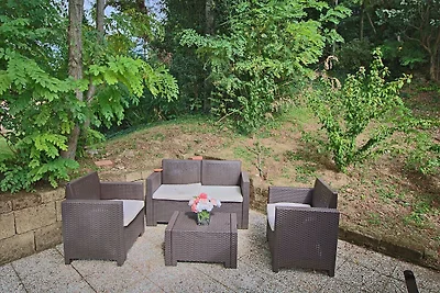 Appartamento con piscina e parcheggio