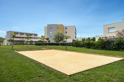 Appartement aan zee met zwembad