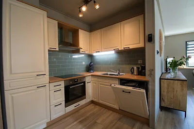 Moderner 4-Personen-Bungalow in Strandnähe