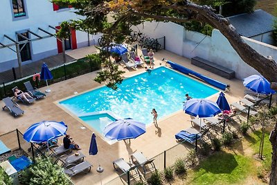 Studio met balkon of terras bij strand