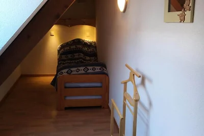 4 Zimmer + 2 Zwischengeschosse, 12 Schlafplät...