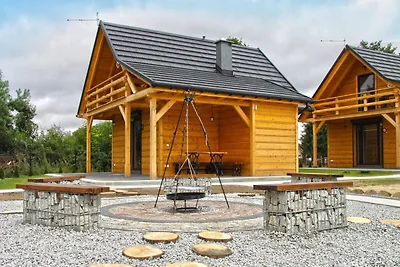 Ein hölzernes Ferienhaus im Highlander-Stil