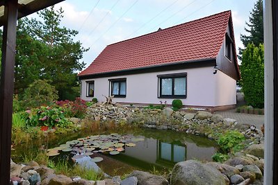 Appartement met blokhut, vijver en overdekte ...