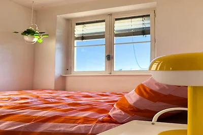 Camera accogliente in un accogliente appartam...