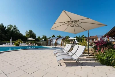 Ferienwohnung am See von Parentis mit Pool