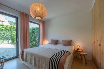 Gelijkvloers appartement met tuin