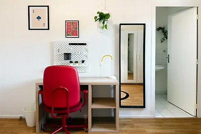 Camera accogliente in un accogliente appartam...