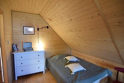 Vakantiehuis met sauna en bubbelbad aan het m...