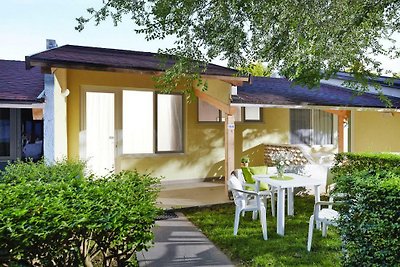 Bungalow in Caorle with garden furniture