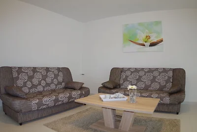 Wohnung in Rakalj mit Garten