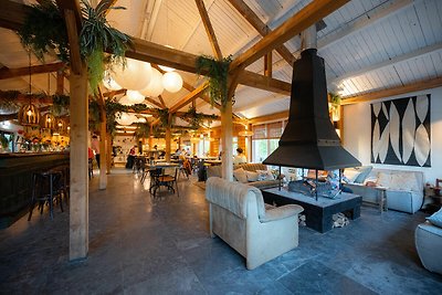 Wellness-Lodge mit Sauna in einem Ferienpark