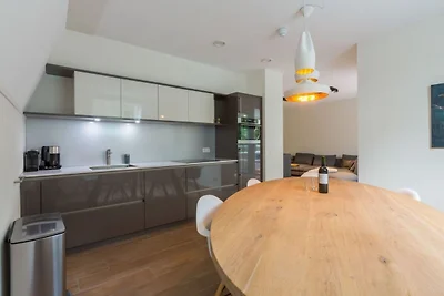 Üppige Wohnung mit Dachterrasse