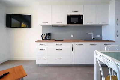 Familieappartement aan het strand in Cap...