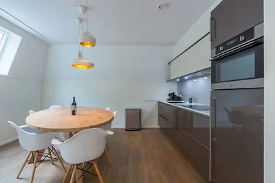 Üppige Wohnung mit Dachterrasse